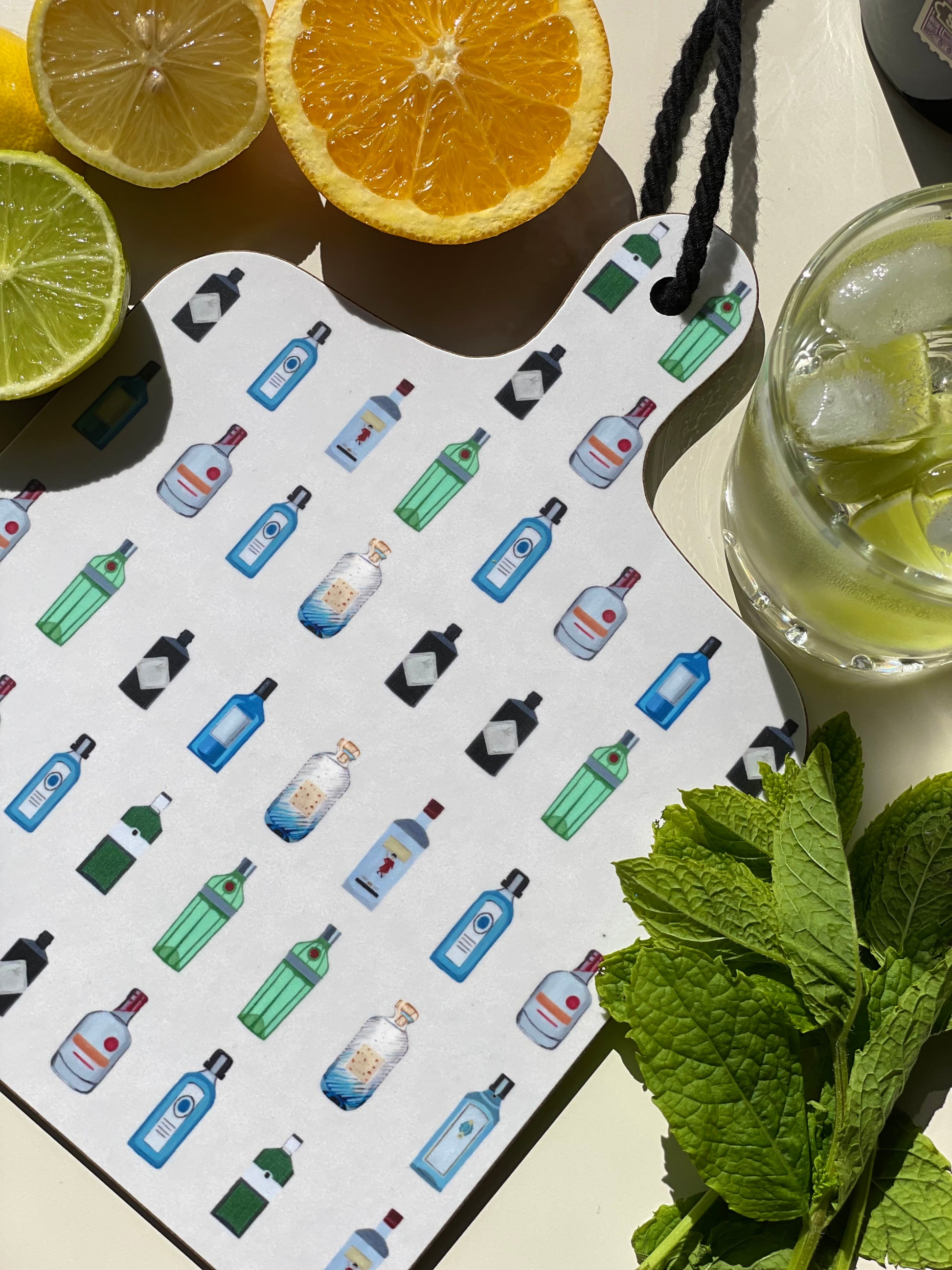 Gin Mini chopping board lemon lime orange mint garnish gin and tonic