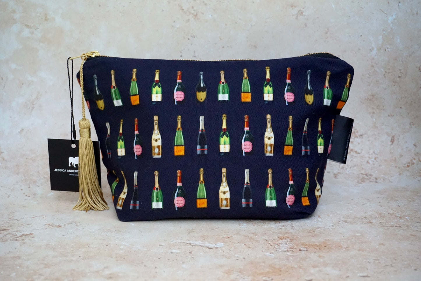 Champagne and Fizz Navy Makeup Bag Jessica Anderton