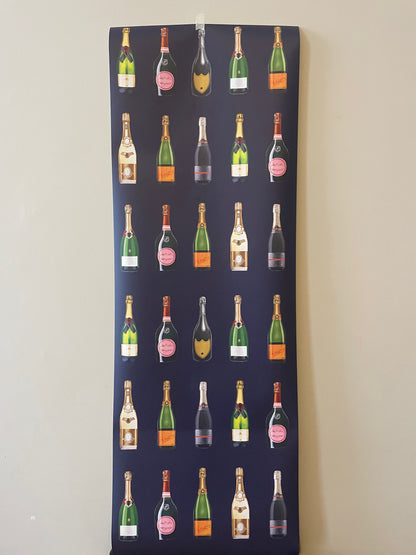 Fabric panel with repeated pattern of wine bottles on a dark background